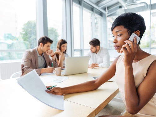 demo-attachment-133-serious-businesswoman-with-documents-talking-on-P9Q6LX6